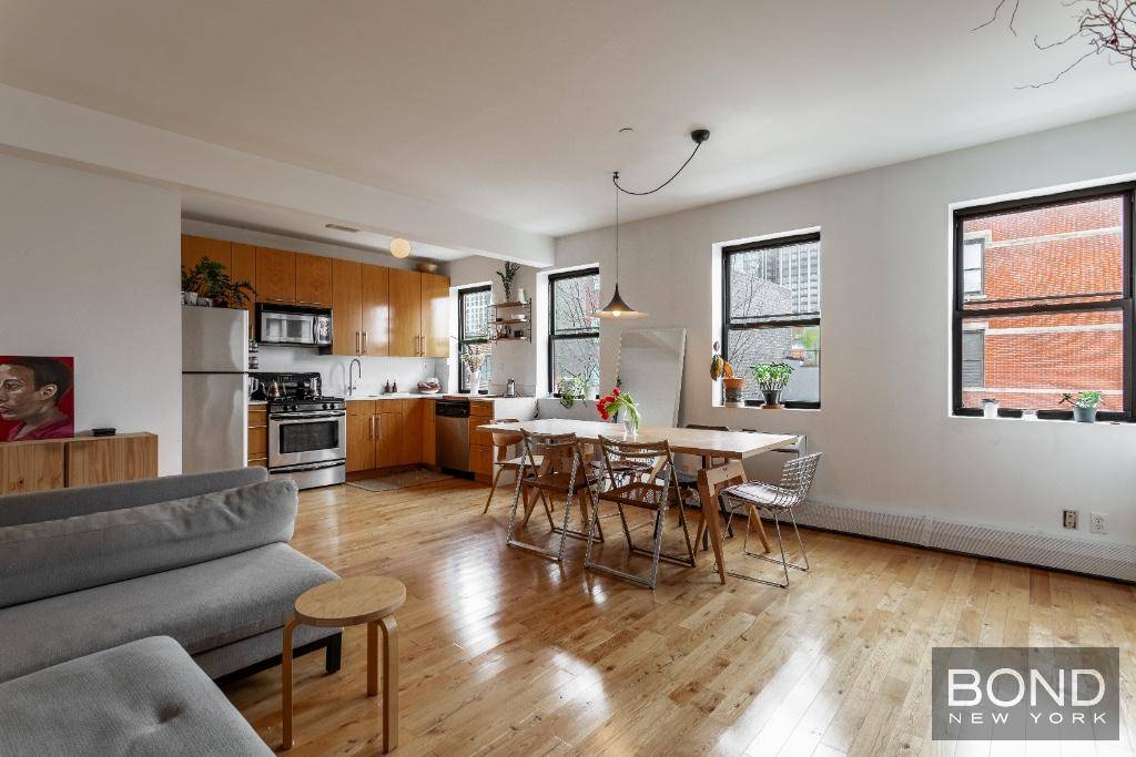 This spacious and bright two bedroom, one and a half bath is located on a beautiful tree lined block in Greenpoint on Green Street between West Street and Franklin Street.