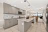 Updated kitchen with gorgeous water views in both the front and back