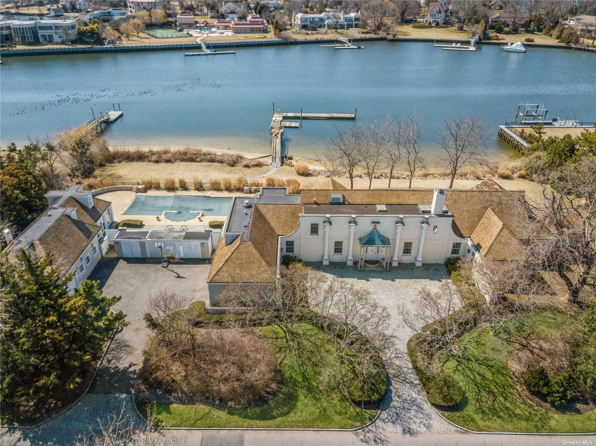 This Spectacular Waterfront Estate sitting on 1.
