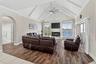 Family Room with Lake and Swimming Pool Views