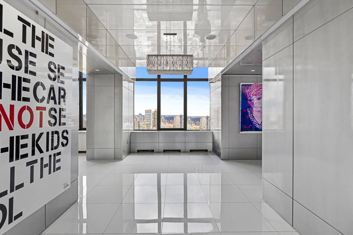 A private keyed elevator opens directly onto a dedicated landing, revealing the entire 41st floor of this extraordinary duplex residence.
