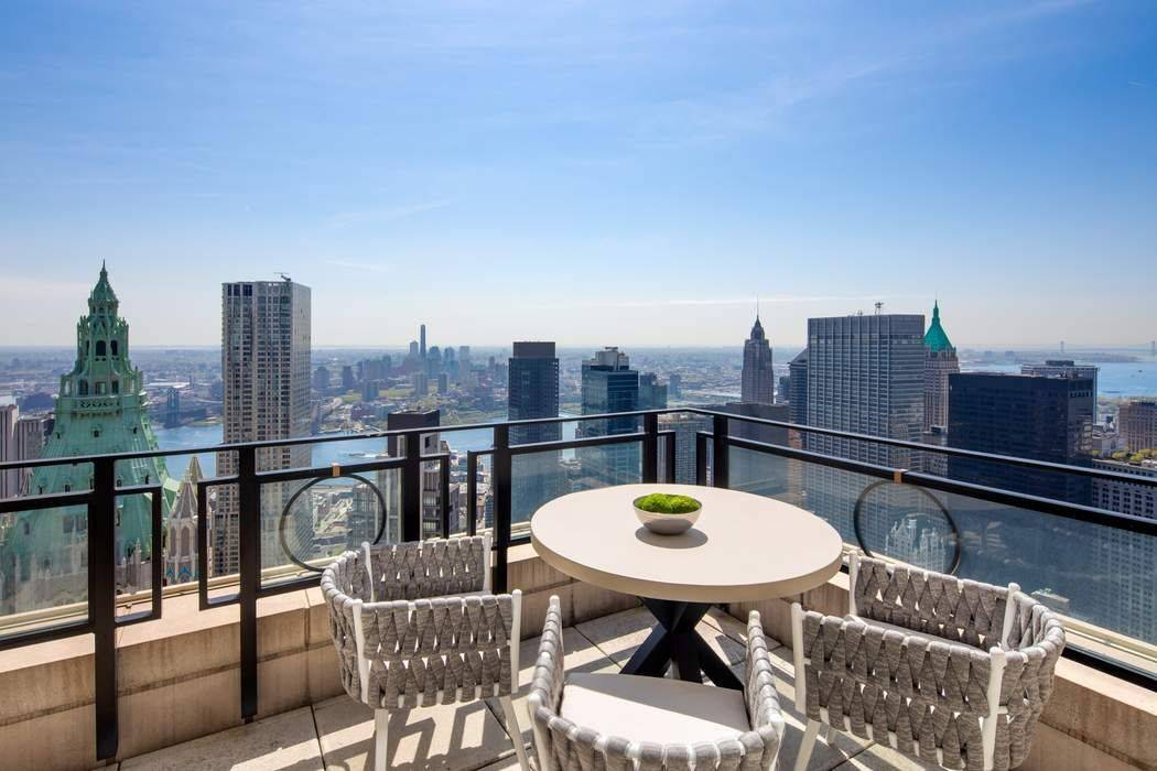 LIVE LIFE LUXURIOUSLY at the Four Seasons Private Residences in a rarely available Half Floor Penthouse with TWO OUTDOOR TERRACES.