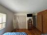 First Floor bedroom #2Full Bed, Closet, Dresser, Mirror, Smart TV , A/C Unit
