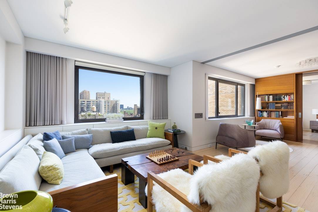 Apartment 23DE at 10 West 66th Street is an impeccably gut renovated corner four bedroom apartment with glorious open northern views of Central Park and the Upper West Side skyline.