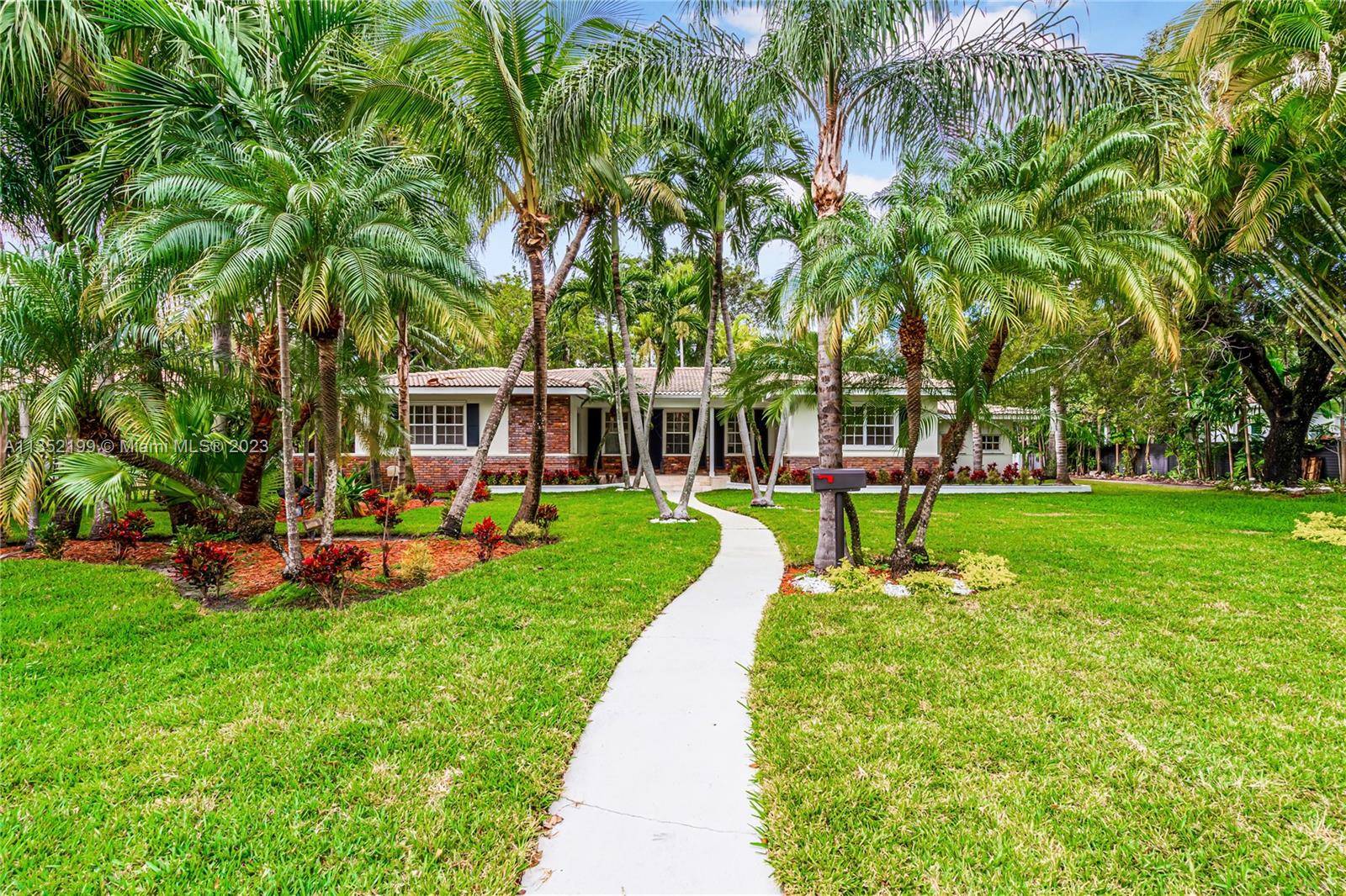 Nestled in the esteemed Bay Point Estates, this enchanting residence claims a prime locale in one of East Bay Miami's most coveted enclaves.