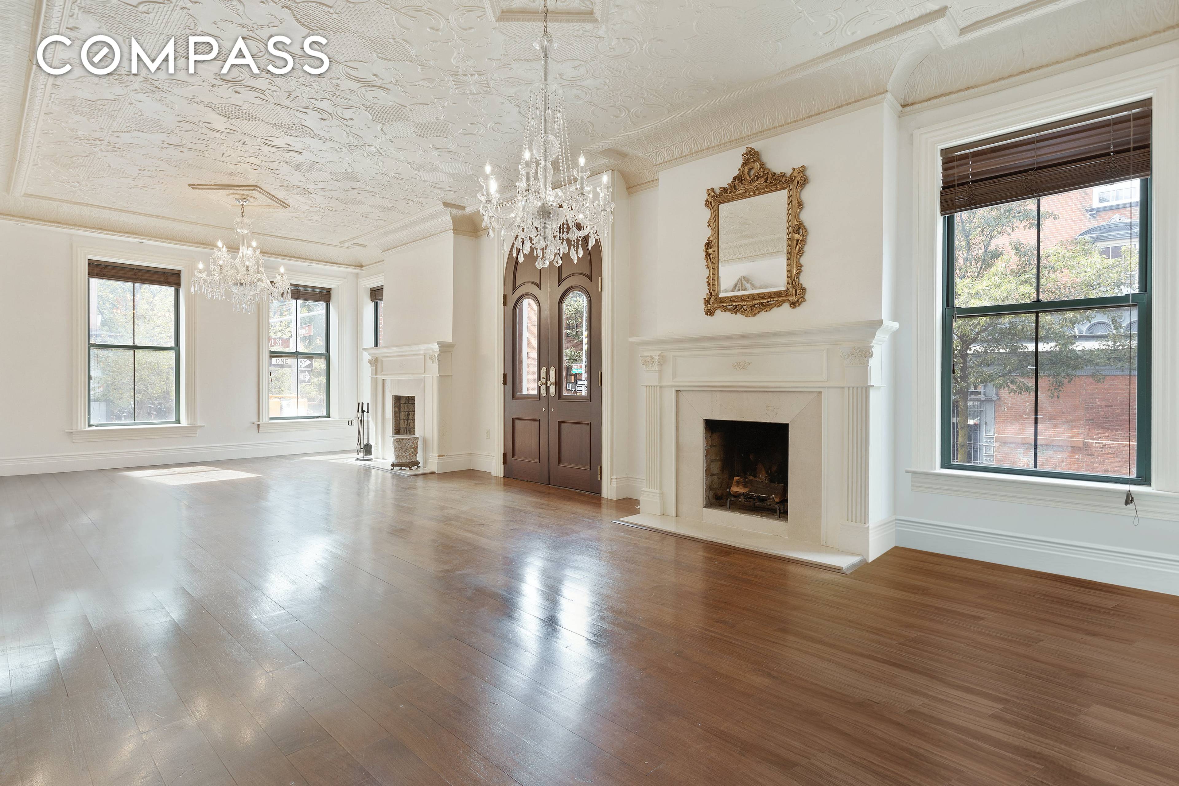 Beautifully renovated, this elegant, spacious two bedroom, two and a half bathroom parlor floor duplex is filled with light and restored original details throughout.