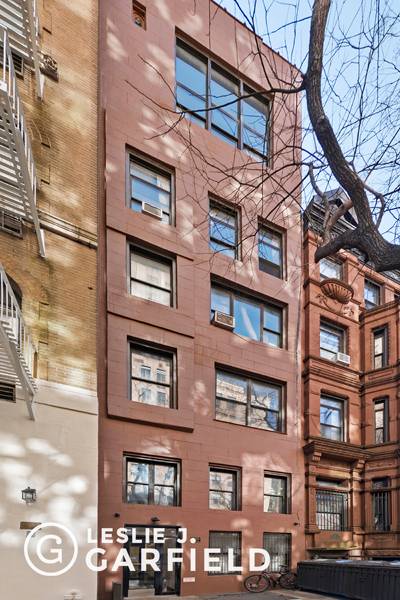 Bring your architect ! Located a stone's throw from Central Park, this 19' wide, elevatored brownstone is ideal for single family conversion.