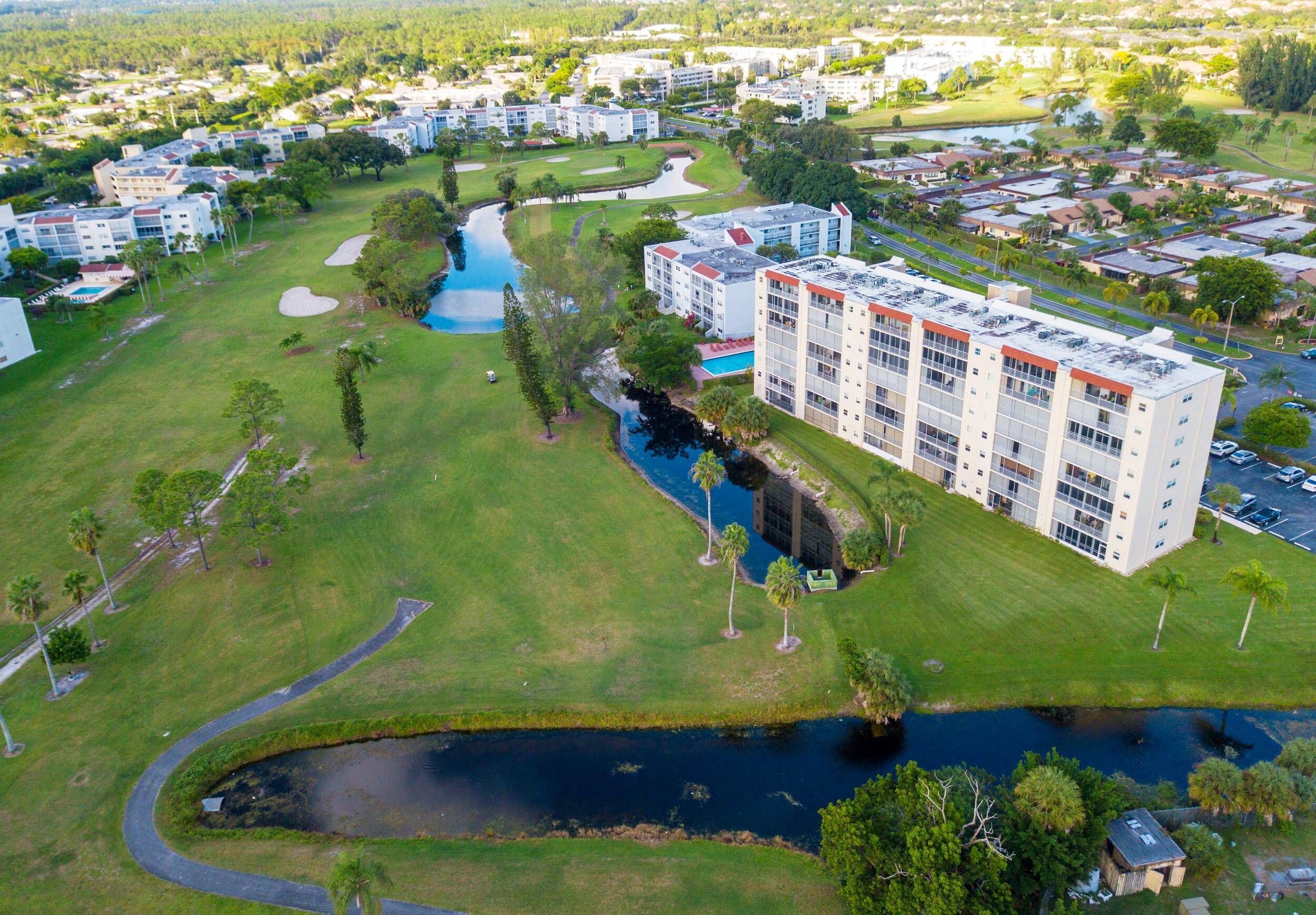 WELCOME TO THIS SPACIOUS UPDATED CONDO WITH BEAUTIFUL DEEP WIDE GOLF WATER VIEWS GORGEOUS SUNSETS !