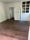 Unfurnished room with dark hardwood / wood-style floors
