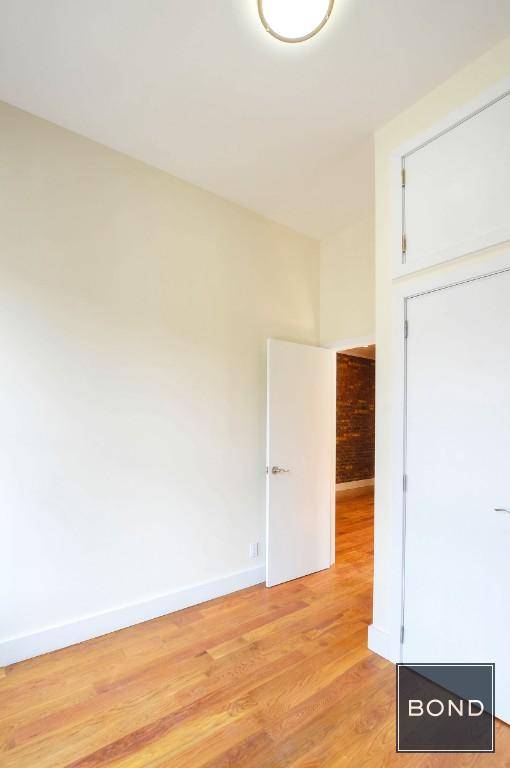 Beautiful renovated 3 Bedroom with laundry in unit in the heart of Little Italy, Manhattan.
