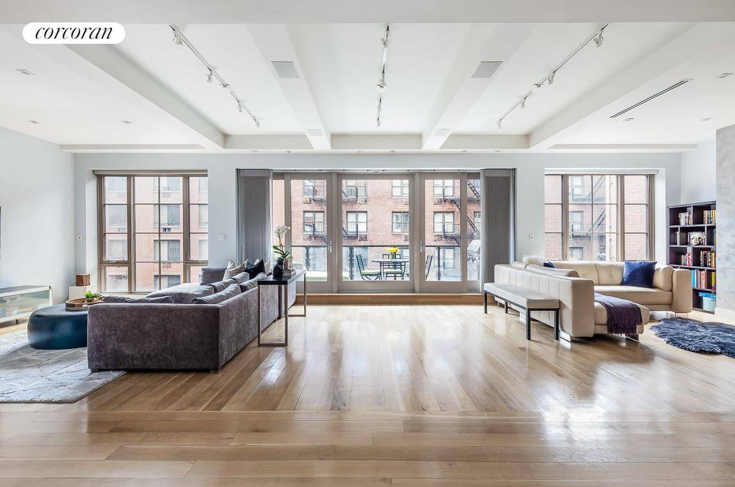 TERRACED FULL FLOOR GRAMERCY LOFT WITH PRIVATE PARKING INCLUDED Designed by renowned architect David Howell and built by GRID Group, this Gramercy boutique condo loft with incredibly low monthlies checks ...