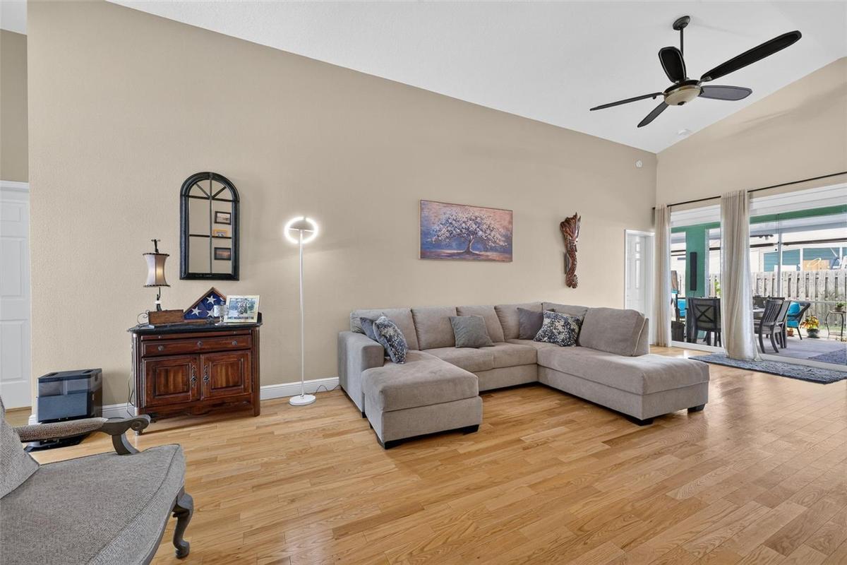 The living area is large and and has sliders leading to the lanai,