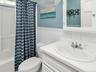 combination with curtain, and a wainscoted wall