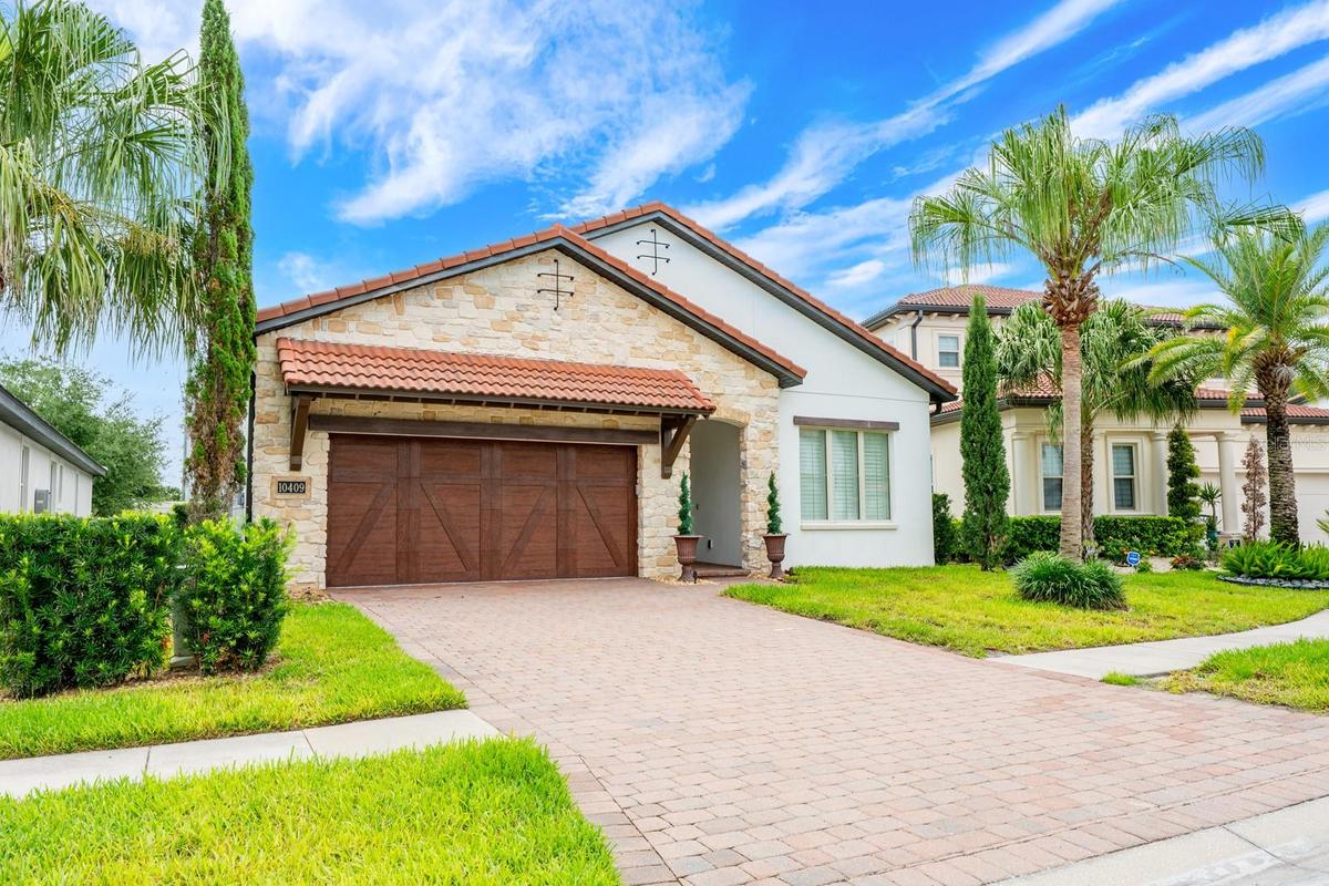 Welcome to this fully reimagined, single-story floor plan in the GUARD GATED COMMUNITY of Royal Cypress Preserve, just minutes from Walt Disney World!