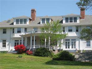 Spacious two bedroom one bath condo in charming Harbor House Mansion.