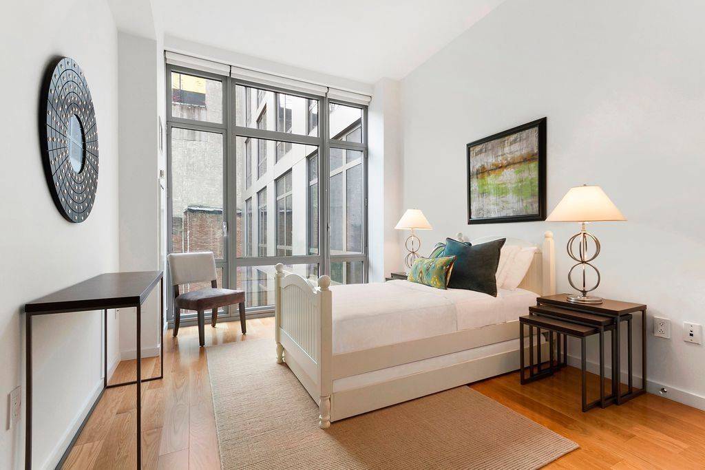 Bask in the Western sun through floor to ceiling windows in this large 1 bed 1 bath at The Link, Midtown West's premier full service building.