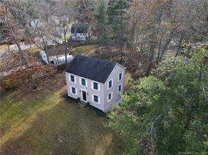 Nestled in the serene heart of Stafford Springs, this captivating 4 bedroom, 1.