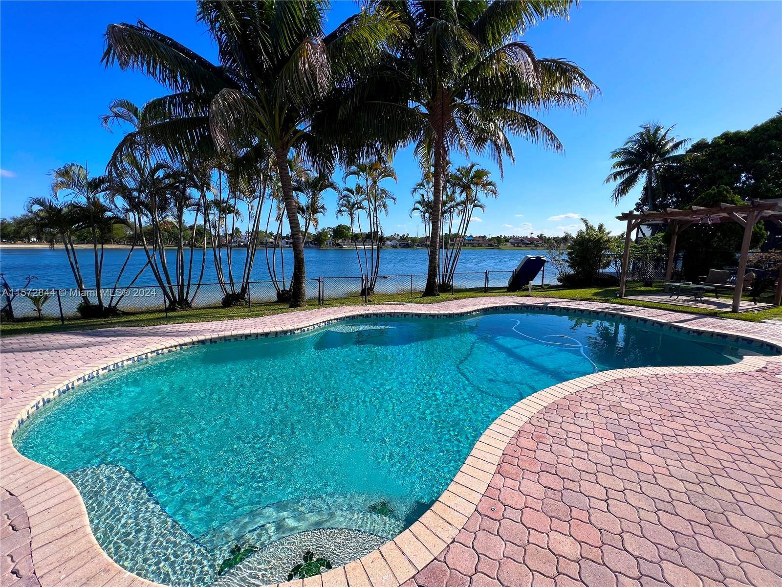 Spacious Lake front house for sale, this 4 bed 2 bath Pool and Lake front home with a 2 car garage is located in the safe and quiet neighborhood of ...