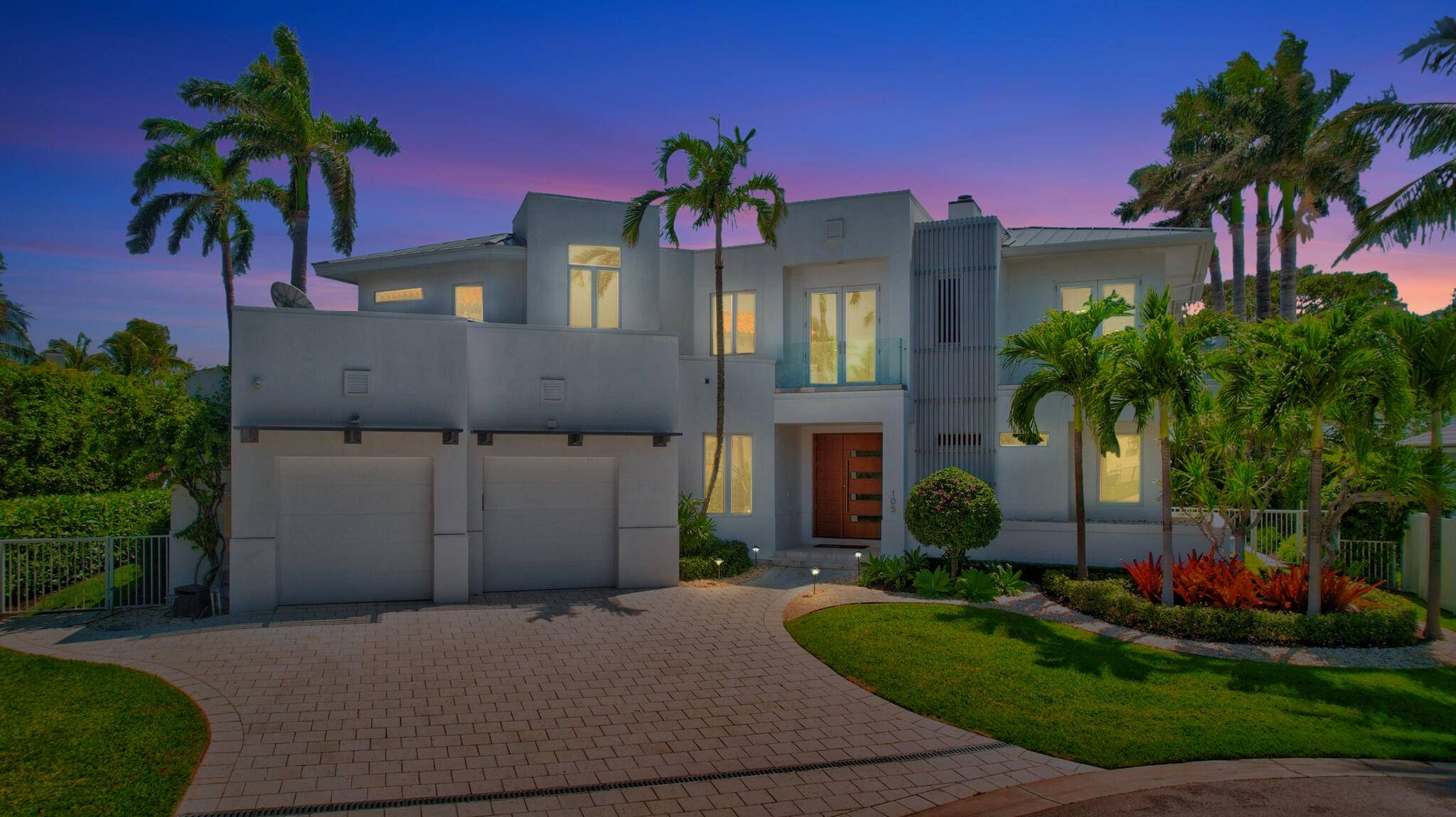 WELCOME TO THIS MAGNIFICENT CONTEMPORARY STYLED HOME WHICH OFFERS SPECTACULAR INTRACOASTAL VIEWS, DESIRABLE SOUTHERN EXPOSURE, AND IS LOCATED JUST ONE LOT OFF THE INTRACOASTAL.
