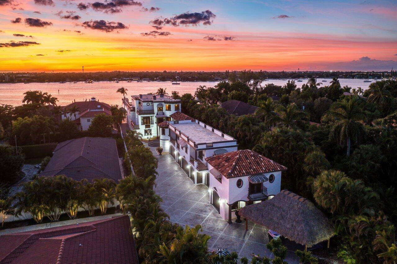 Introducing Chateau Rosmar, an exquisite 3 4 acre private Mediterranean Intracoastal estate on Hypoluxo Island.