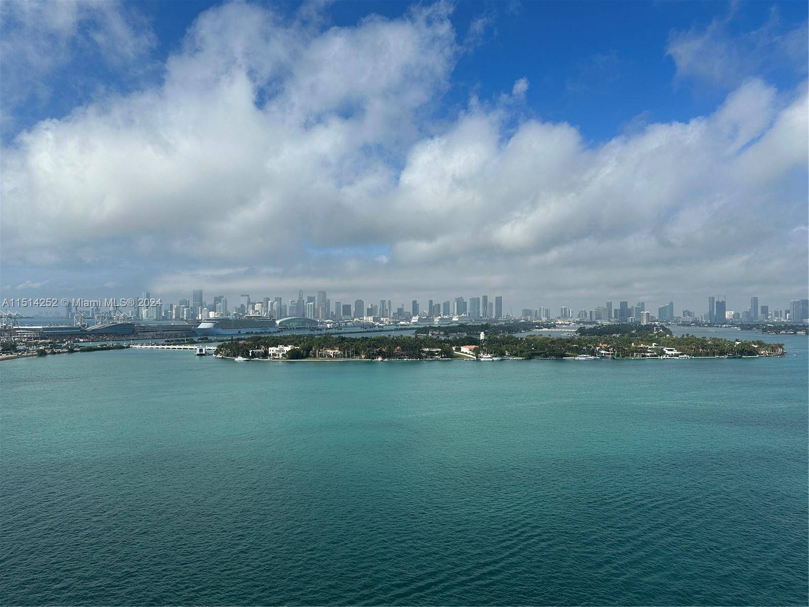 Breathtaking water, Miami skyline, and Star Island views from the 18th floor at the Bentley Bay.