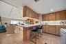 KITCHEN that faces the living room and gulf. Seating for 4 as a breakfast area