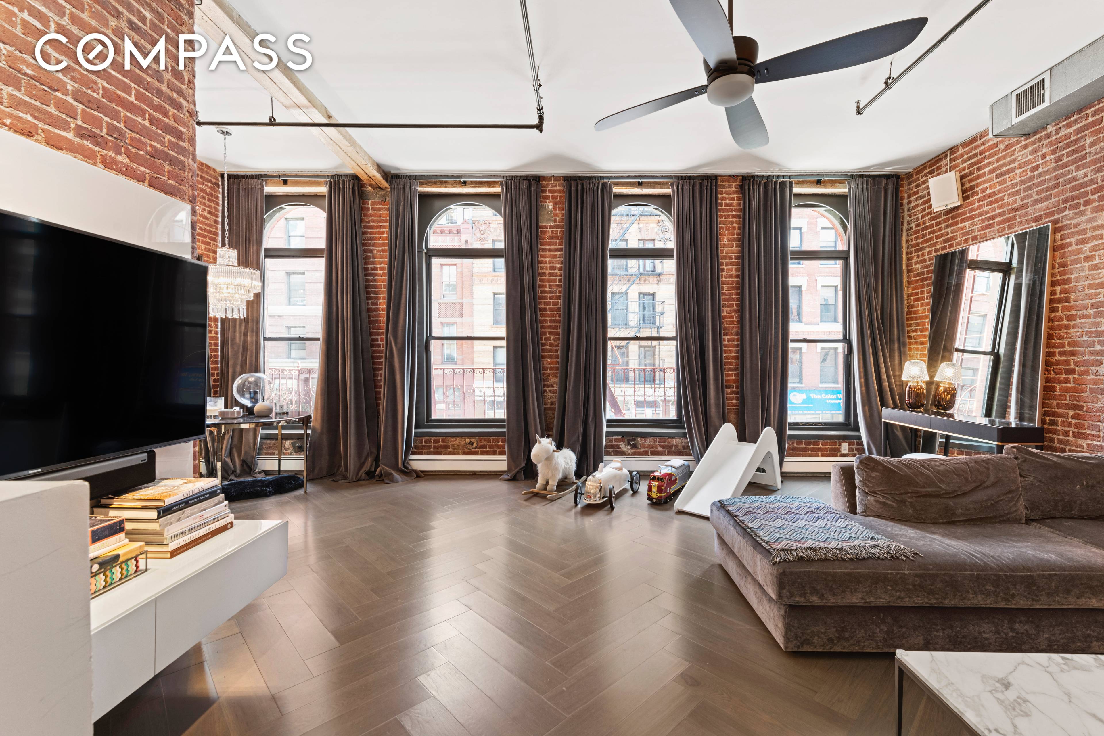 Chic and sophisticated, 2500 SF, floor through pre war loft that benefits from three exposures, 3 bedrooms, 2 bathrooms, and a home office located at the crossroads of Soho and ...