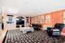 Open and comfortable family room with abundant light and built-ins.