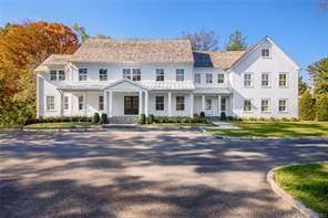 This newly constructed Nantucket Style Colonial, exudes timeless elegance.
