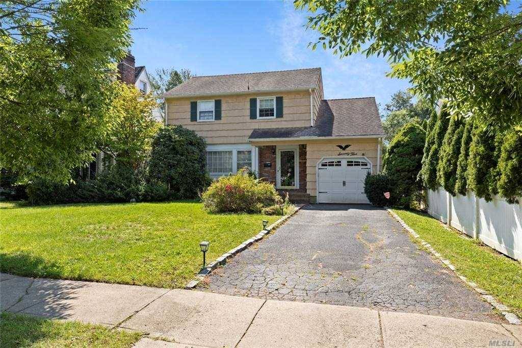 Beautiful, North Syosset 4 Bedroom, 2 Full Bath Colonial on Gorgeous Oversized Property.