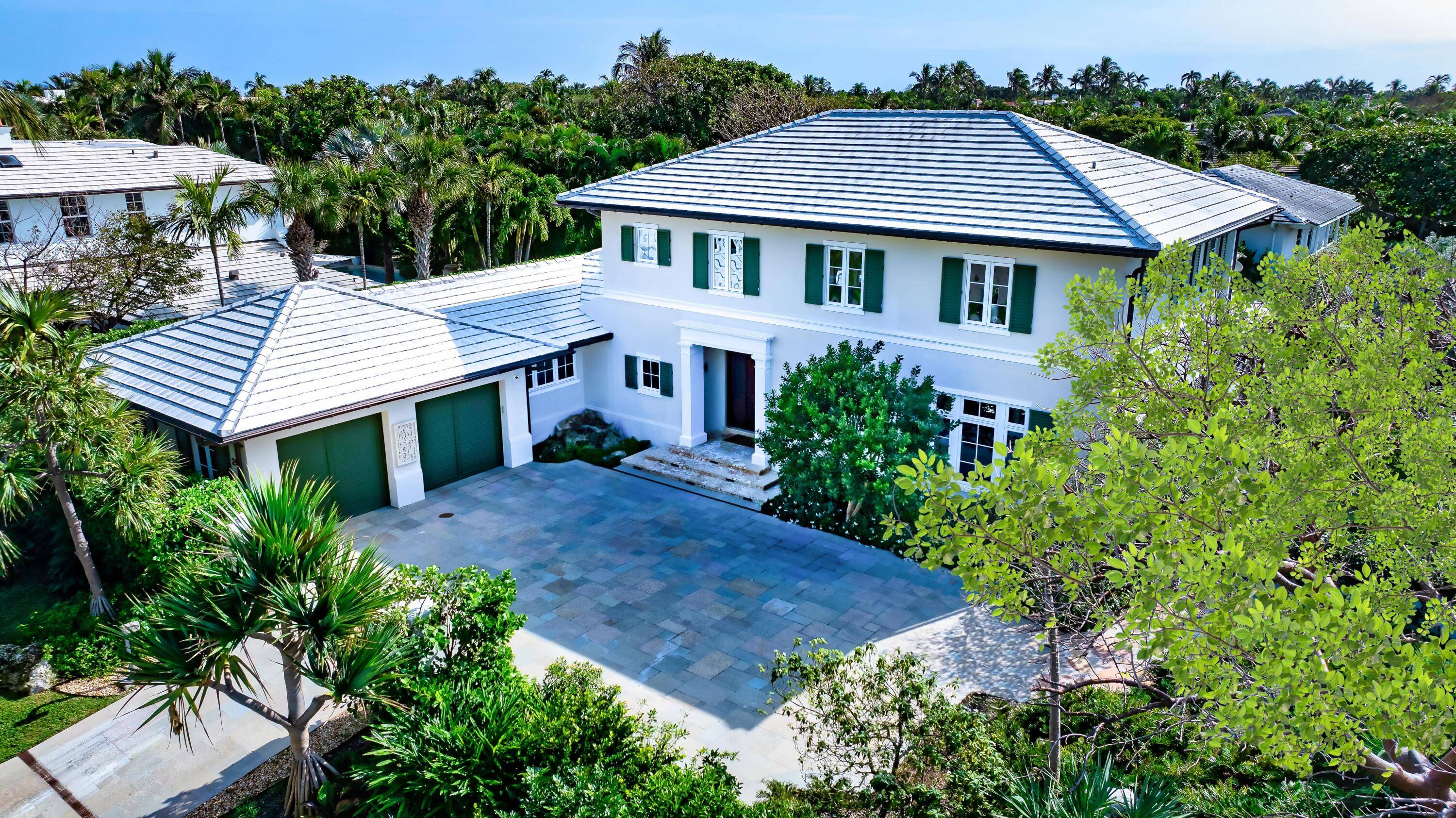 Welcome to 1333 N Lake Way 250 Angler Ave, an exceptional multi structure compound on the North End of Palm Beach Island.