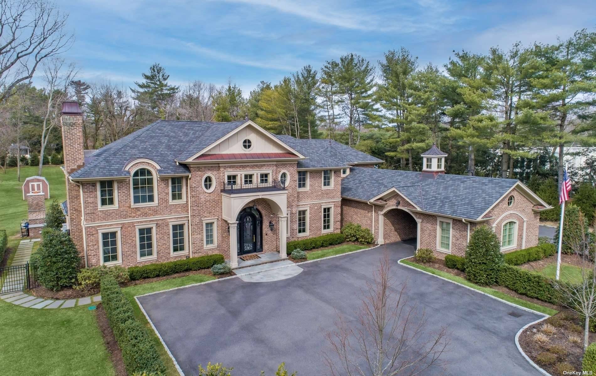 Captivating custom built Brick Colonial, built in 2019, radiates quality and style.