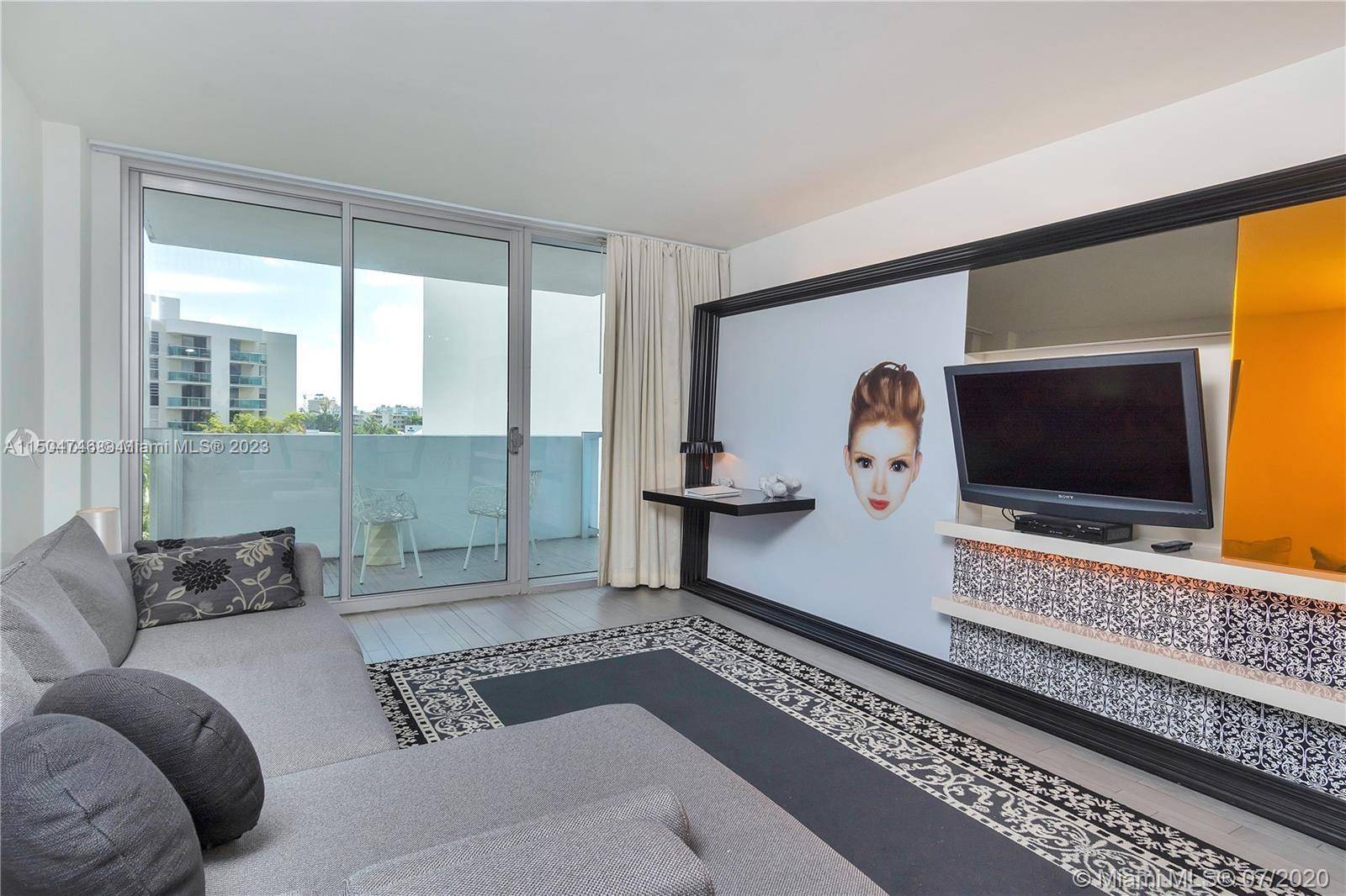 AMAZING HIGH FLOOR 1 BEDROOM CORNER UNIT WITH BALCONY WITH 1 QUEEN BED IN THE BEDROOM 1 QUEEN SOFA BED IN THE LIVING ROOM AT THE FAMOUS 1100 WEST CONDO ...