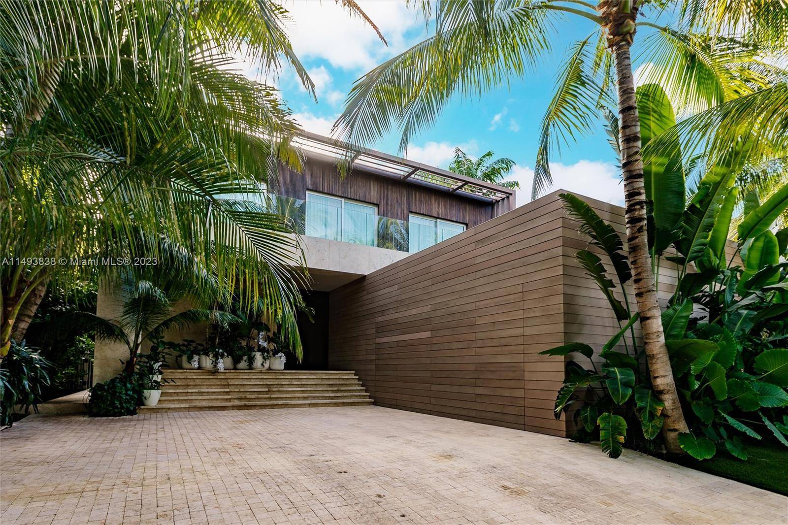 Stunning Luxurious 5393 sq ft minimalistic masterpiece located on one of the most sought after islands on Miami Beach.