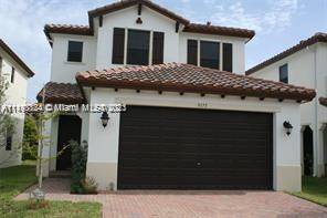 LIKE NEW 3 BEDROOM 2. 5 BATH 2 CARAGE HOME, FEATURES INCLUDE GRANITE COUNTERS, STAINLESS STEEL APPLIANCES, DARK WOOD CABINETS, GATED COMMUNITY, WITH POOL, COVER PAVILION AND PARKS.