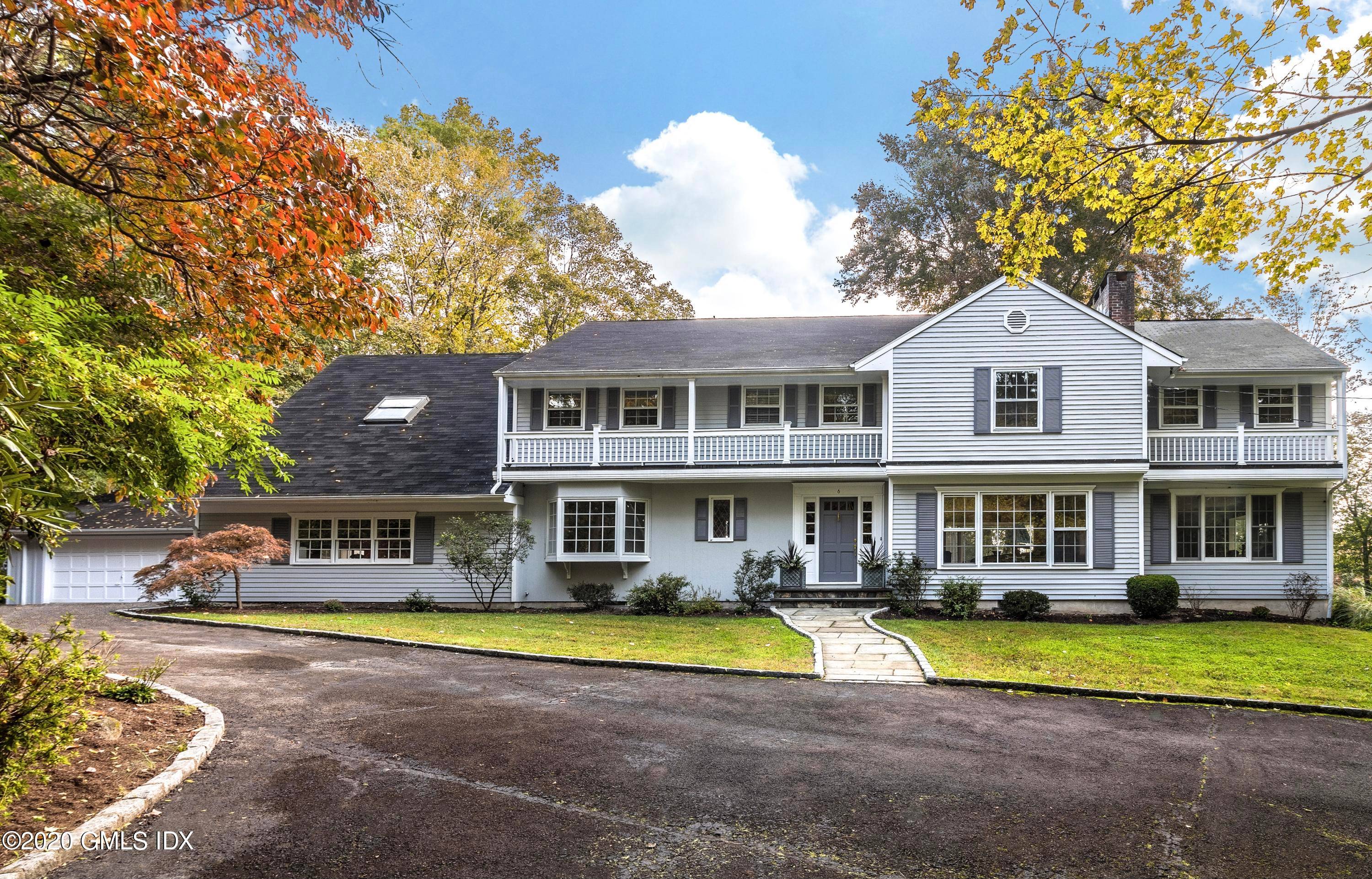 Spacious sunlit colonial, on a quiet cul de sac in the heart of mid country.