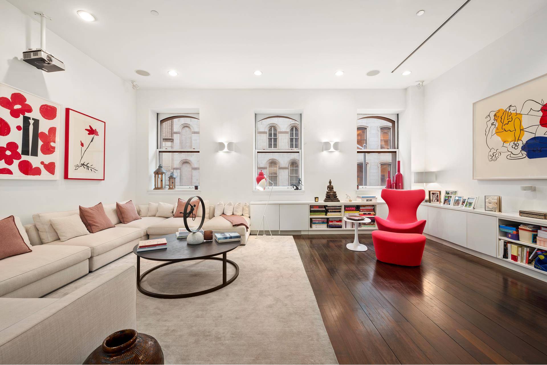 Enjoy the quintessential downtown lifestyle in a luxurious Tribeca condo loft !