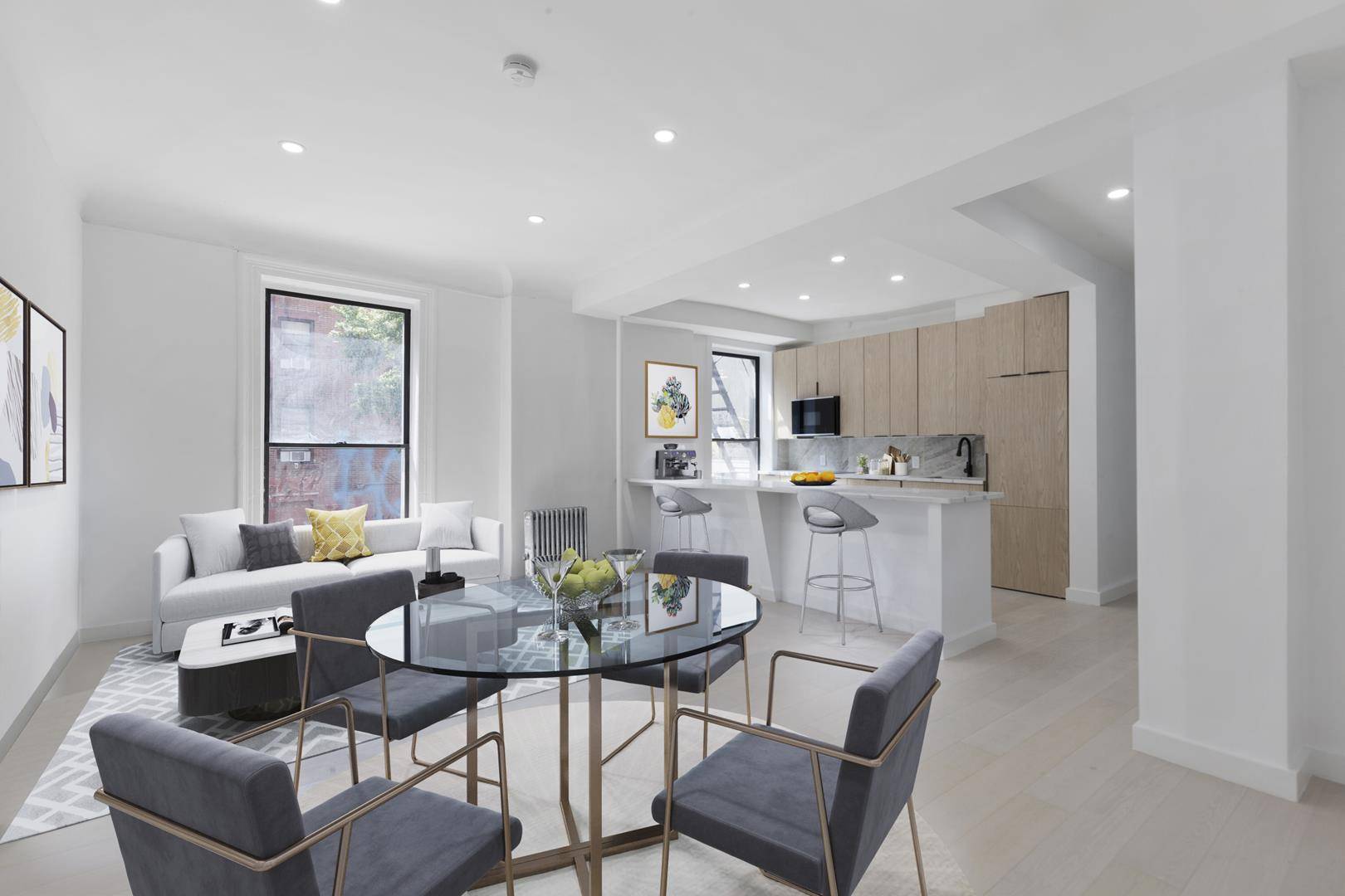 A RARE FIND this brand new, gut renovated apartment in the heart of the East Village boasts polish, charm, and optimal convenience.