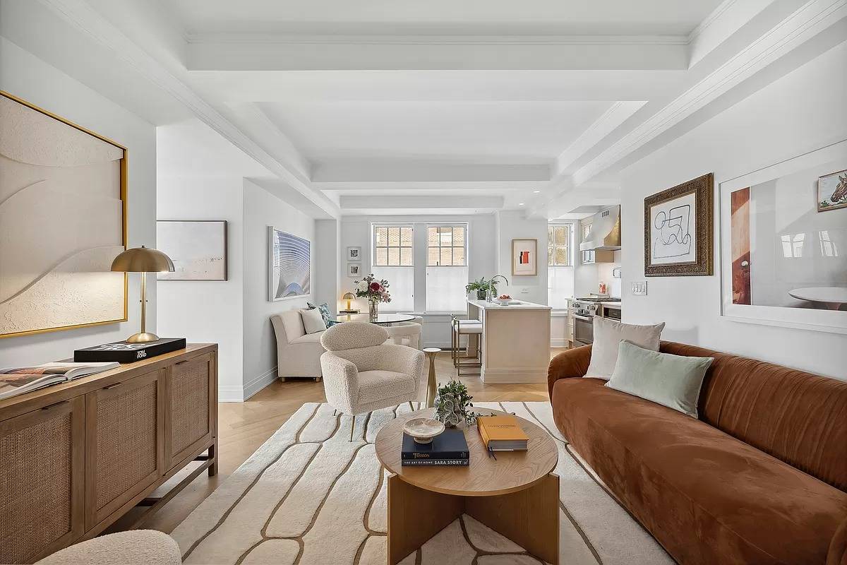 Elegant living with this exquisite corner one bedroom residence offering breathtaking views of Central Park.