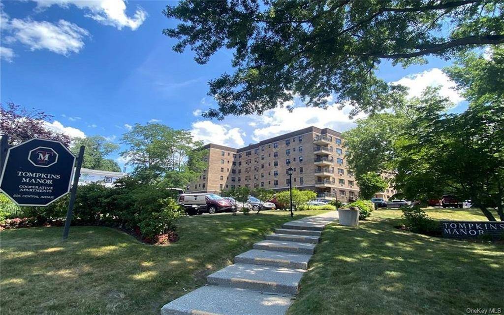 Sun filled one bedroom apartment with wall to wall carpet in Tompkins Manor, Co op building on Central Park Avenue just across from H Mart, CHASE bank shopping center.