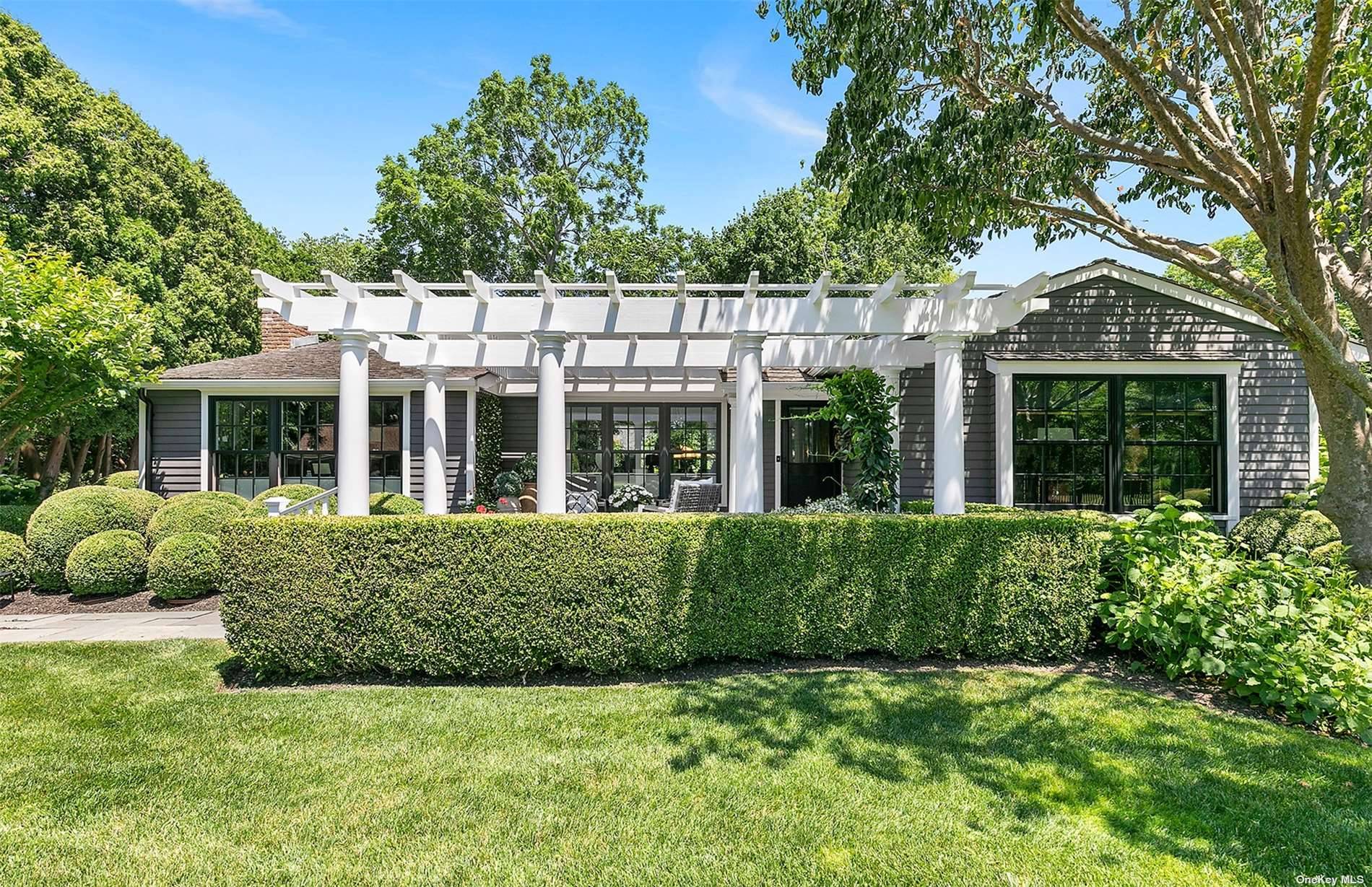 Must see ! Well known designer's own home in the heart of East Hampton Village !