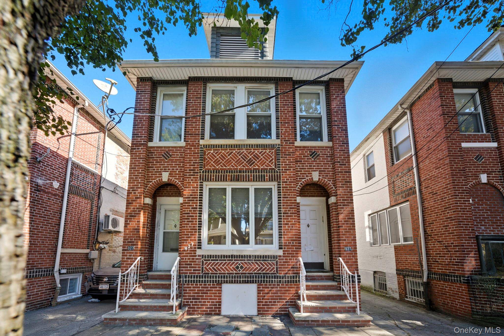 Welcome to this charming fully detached Brick 2 family home with a finished basement.