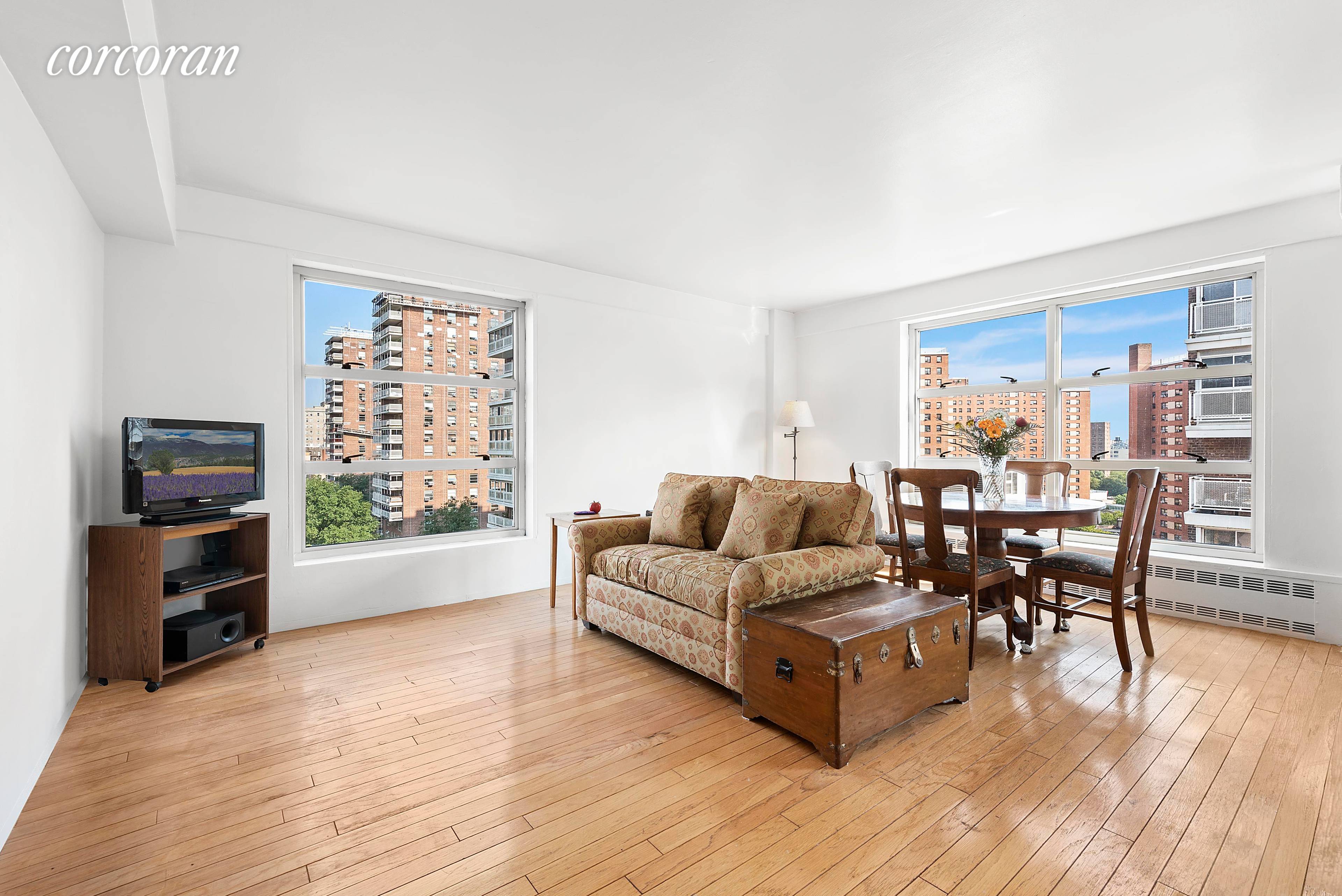A View from The Top ! This spacious two bedroom one bath apartment 11th floor gem boasts a BREATHTAKING CLASSIC New York City view situated in the middle of lush ...