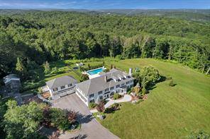 One of Litchfield s largest estates, on almost thirty acres, this 12, 000sf Center Hall Colonial is perched on your own sprawling park w stonewalls, heated saltwater Gunite pool, bluestone ...