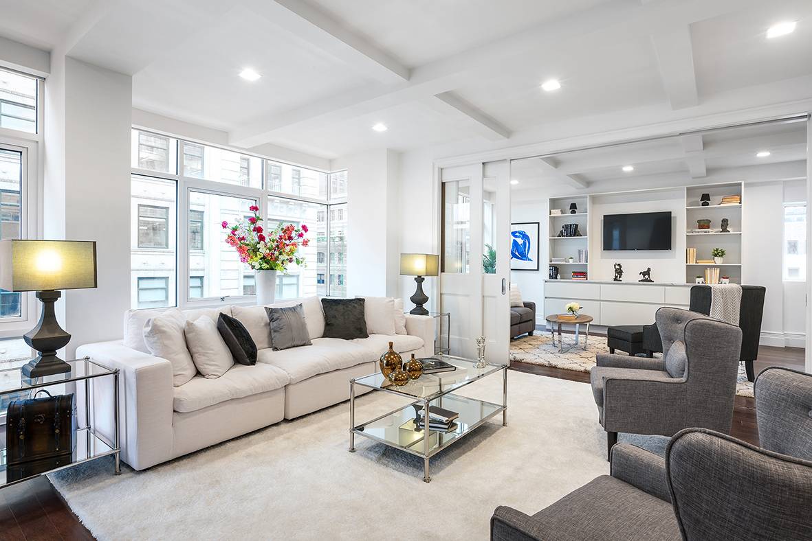 A fully furnished triplex penthouse nestled in the heart of Hudson Square !