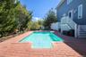 Outdoor pool featuring a patio