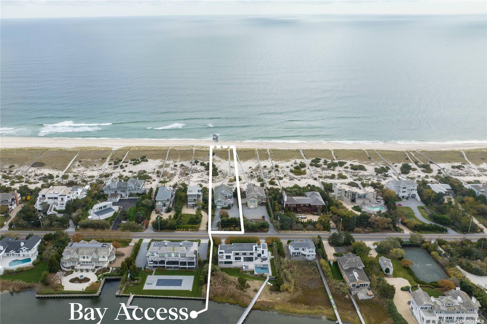 Located in prime jetty protected beachfront in Westhampton Beach, between the bridges, this easy living open concept home offers stunning ocean views from the chef's kitchen, living room, and large ...