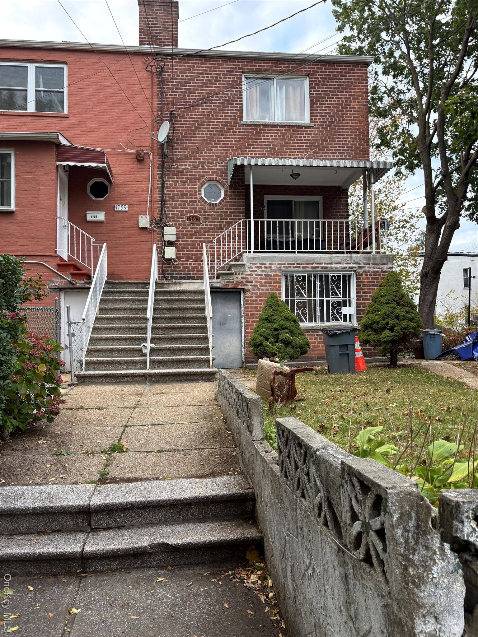 Welcome to this beautiful semi attached brick two family home offering the perfect blend of comfort, convenience, and income potential.