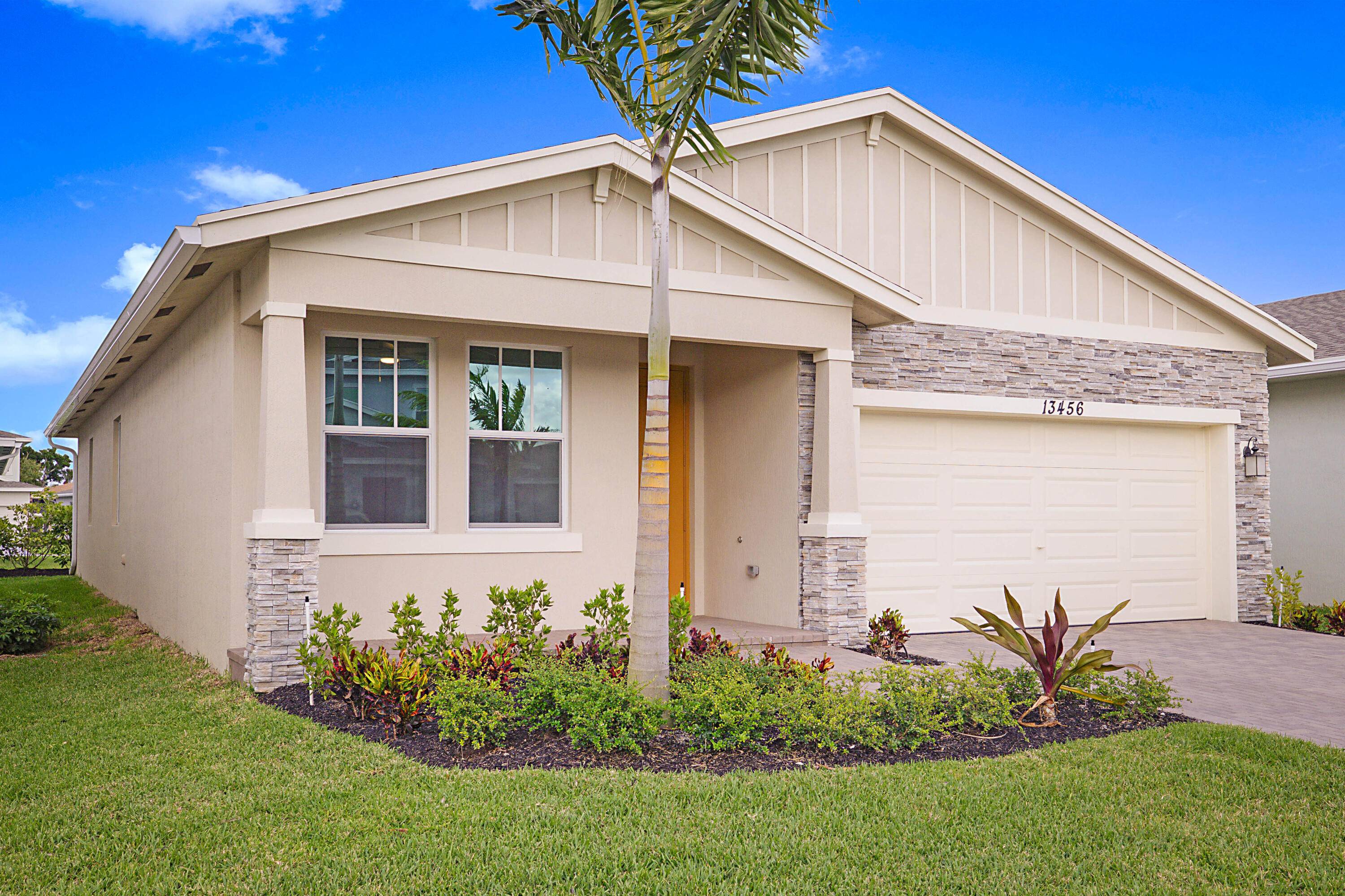Step into luxury living just moments away from vibrant downtown Delray Beach !