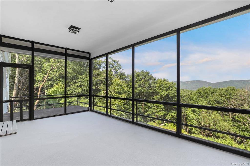 This remarkable, newly renovated house offers staggering, panoramic mountain views, XL window panes throughout the living space, a deck that runs the length of the house for entertaining, a screened ...